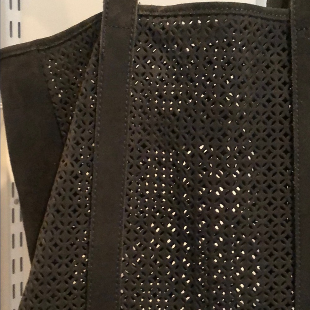 Suede laser cut tote bag.